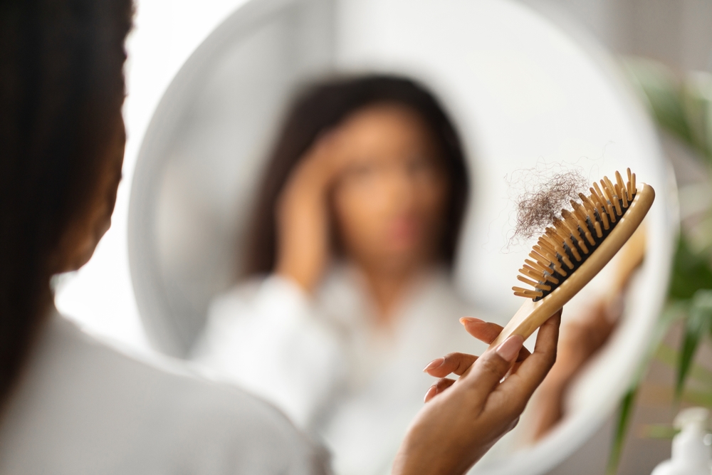 Alopecia androgenética feminina: causas, sintomas e tratamentos
